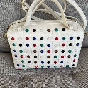Charming Charlie crossover/handle purse. Colorful dots.
